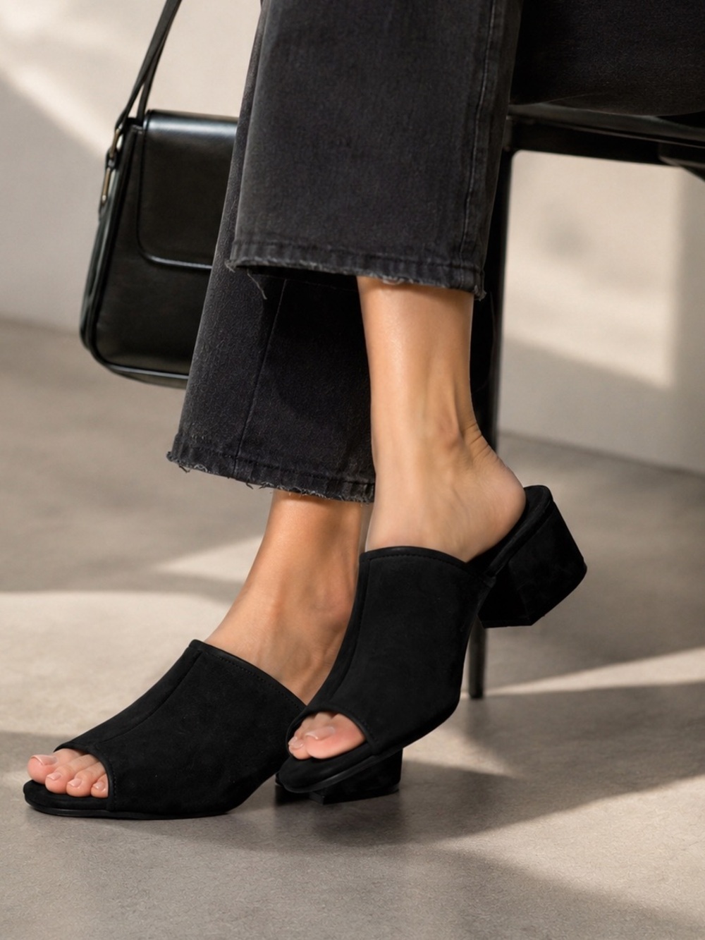 Eileen Fisher Fala Tumbled Nubuck Mules in black, size 8.5. A sleek, minimalist